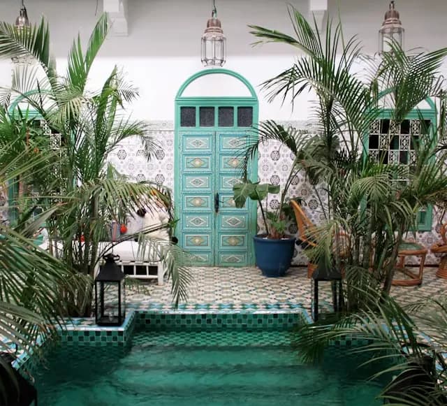 Traditional Moroccan riad courtyard with fountain